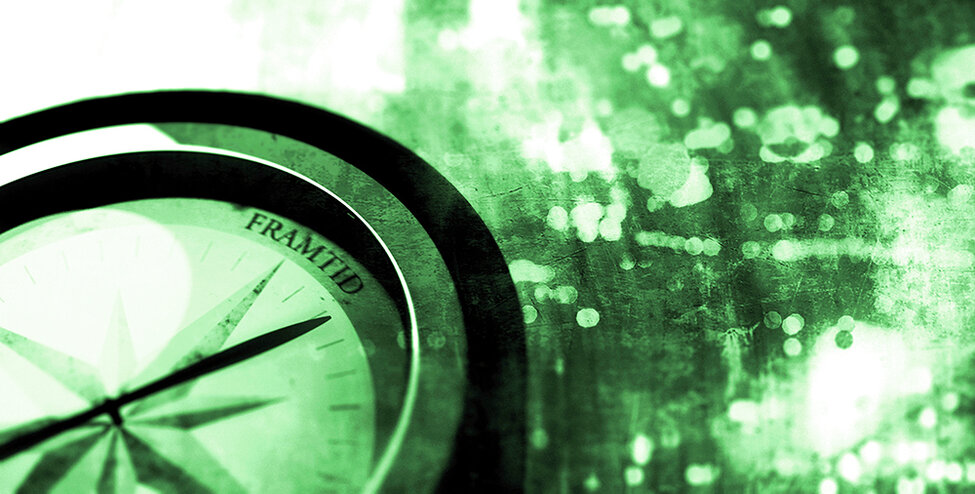Stiliserad bild av kompass med nålen riktad mot ordet framtid.
